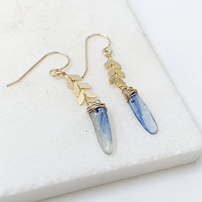 Elegant Kyanite Gold Chevron Earrings showcasing polished kyanite gemstones, brass chevron details, and gold earwires for a chic accessory.