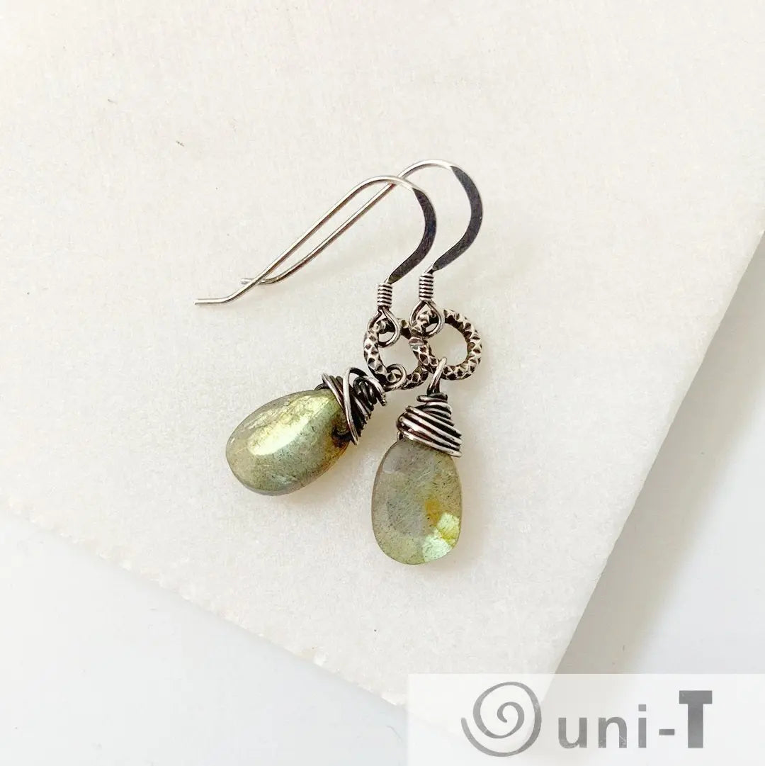 Labradorite earrings with 1-inch faceted teardrop beads, wire wrapped in antiqued sterling silver, perfect for elegant everyday wear.