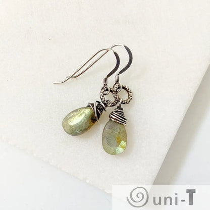 Labradorite earrings with 1-inch faceted teardrop beads, wire wrapped in antiqued sterling silver, perfect for elegant everyday wear.