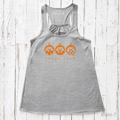 Heather gray women's flowy tank top with orange 'Laugh More' print. Comfortable and stylish for spreading positivity in everyday outfits.