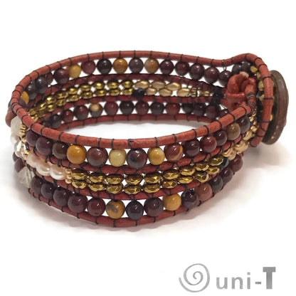 Gemstone cuff bracelet with quartz, citrine, and mookaite beads on brown leather wrap. 7.5” long with brass button clasp.