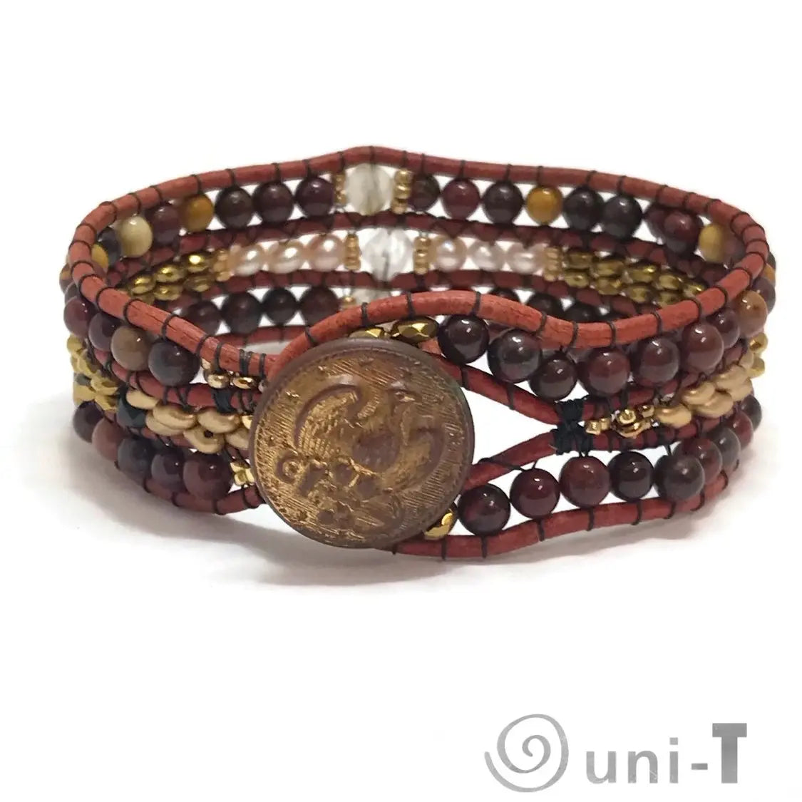 Front view of quartz and leather gemstone cuff bracelet featuring hematite, citrine, and mookaite beads with brass button.