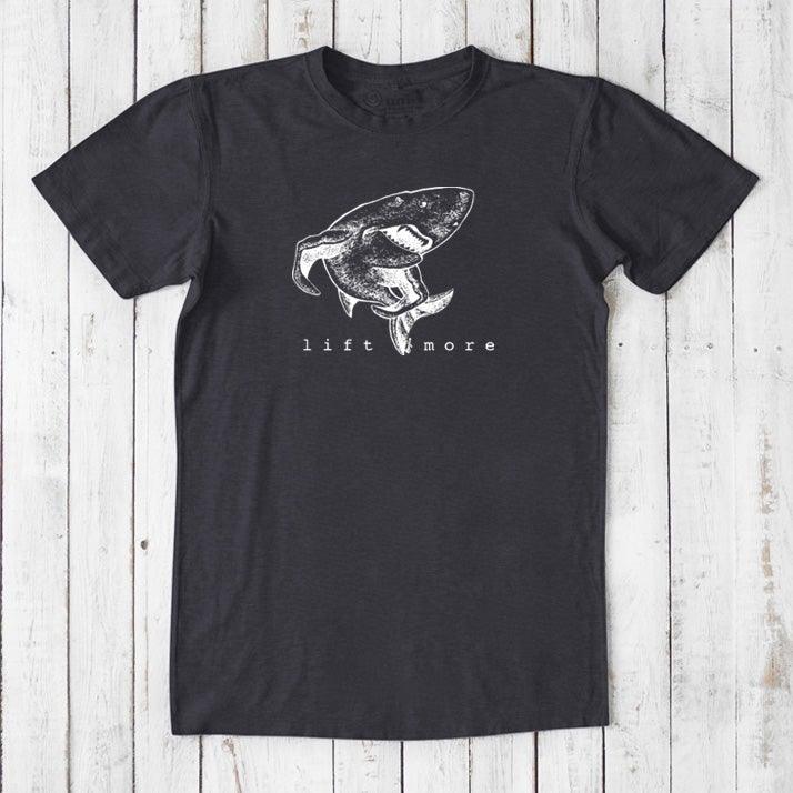 Black men's bamboo and organic cotton t-shirt featuring white shark and 'Lift More' text, perfect for fitness enthusiasts.