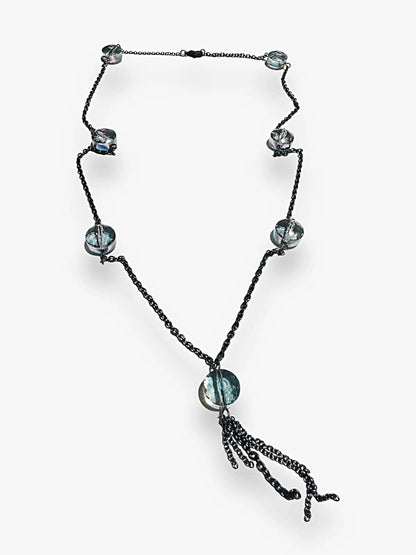 20-inch long crystal chain necklace featuring iridescent beads and a dark brass chain with tassel, ideal for stylish layering jewelry.