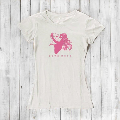 Ivory white Love More T-Shirt for women with pink heart graphic, crafted from bamboo & organic cotton. Romantic and sustainable gift idea.