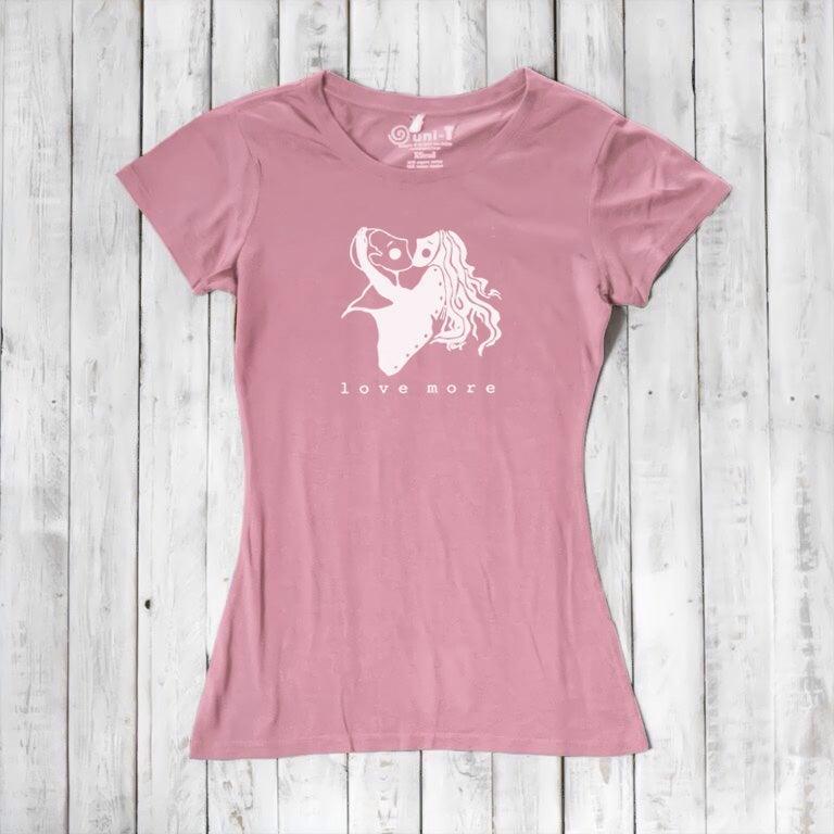Light pink Women's Love More T-Shirt in bamboo & organic cotton with white heart graphic. Perfect romantic eco-gift for girlfriend or wife.