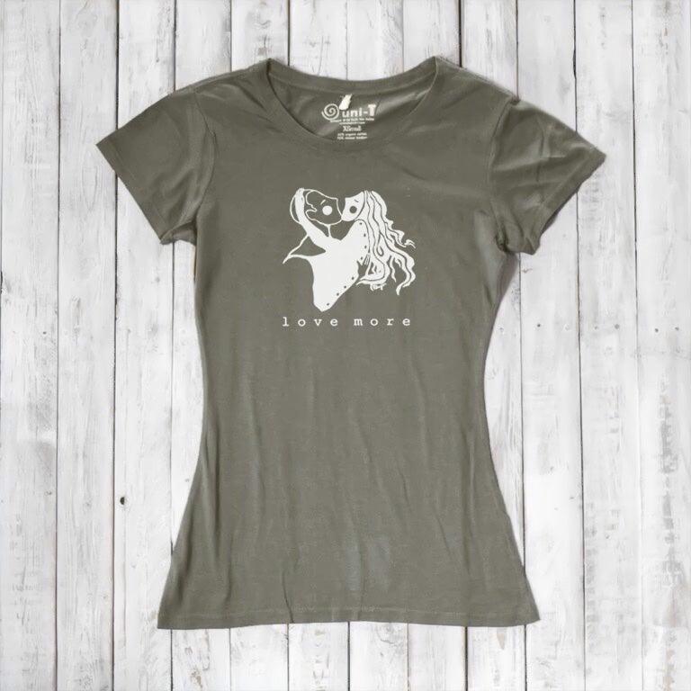 Olive green Women's Love More T-Shirt in bamboo & organic cotton with white heart graphic. Eco-conscious romantic apparel gift.