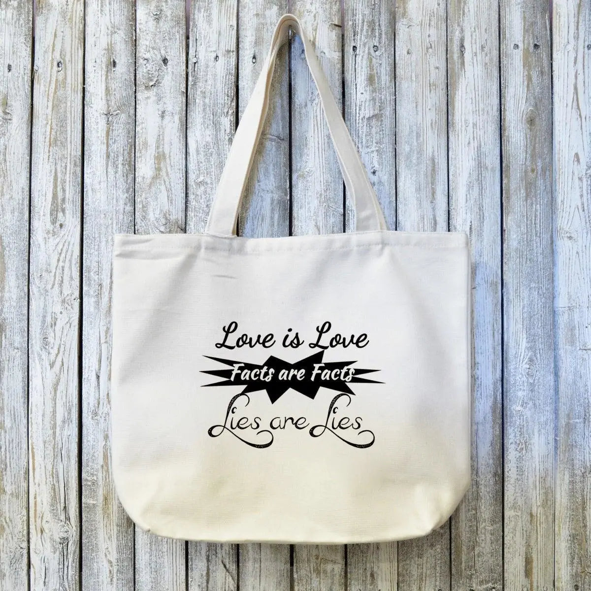 Organic Canvas Tote Bag - Sustainable | Durable Design with 'Love is Love, Facts are Facts, Lies are Lies' artist typography in black ink.