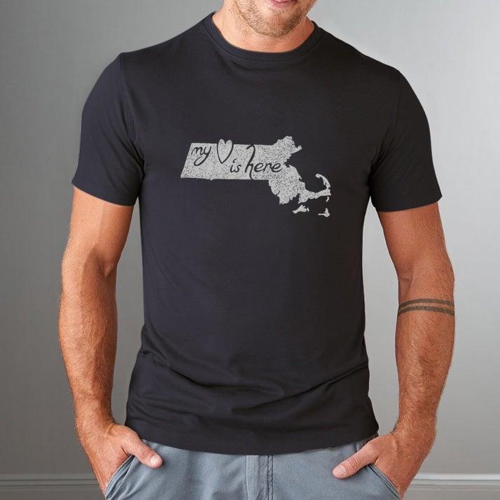 Man modeling black bamboo and organic cotton Massachusetts T-Shirt with 'My Heart Is Here' graphic, ideal local pride gift for him.