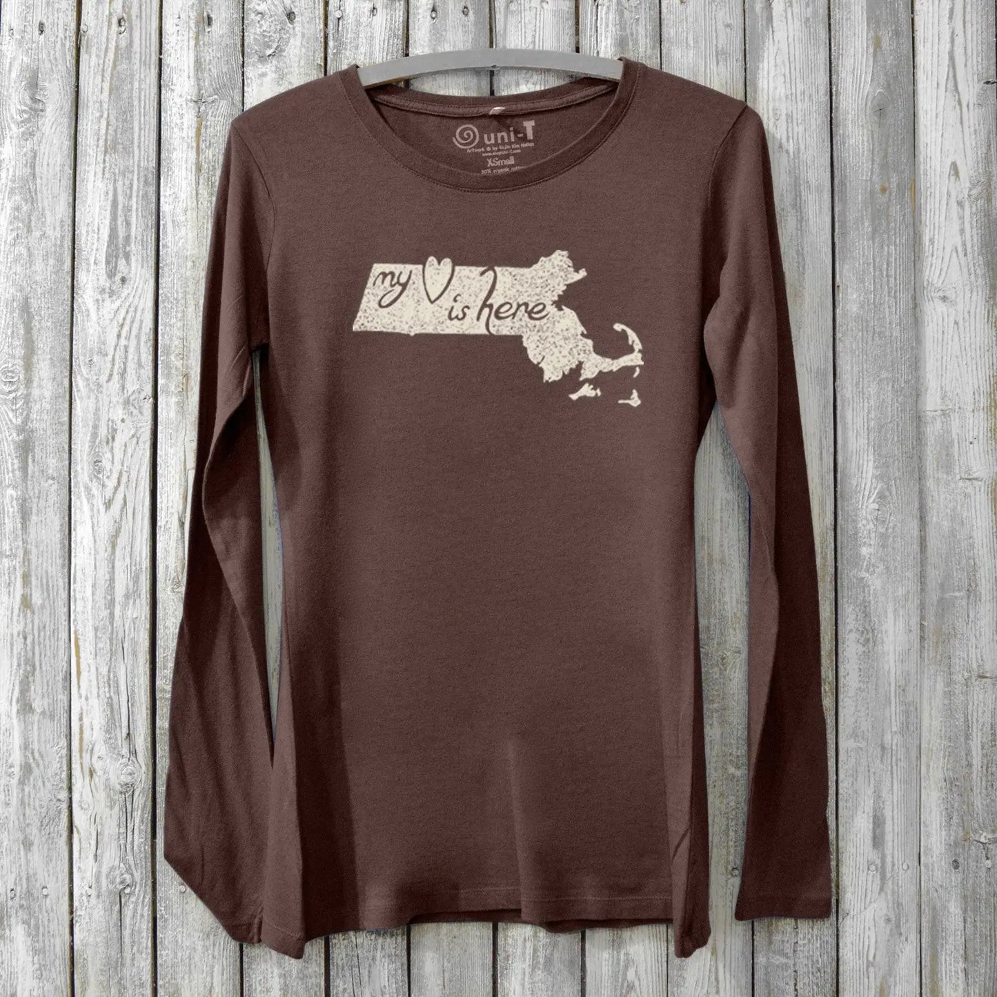 Dark brown women's long sleeve graphic tee in bamboo and organic cotton with Massachusetts map and 'My Heart Is Here' design. Ideal local pride gift.