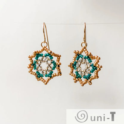 Sterling Silver Green Medallion Earrings featuring intricate floral beadwork in forest tones, perfect for elegant and artistic styling.