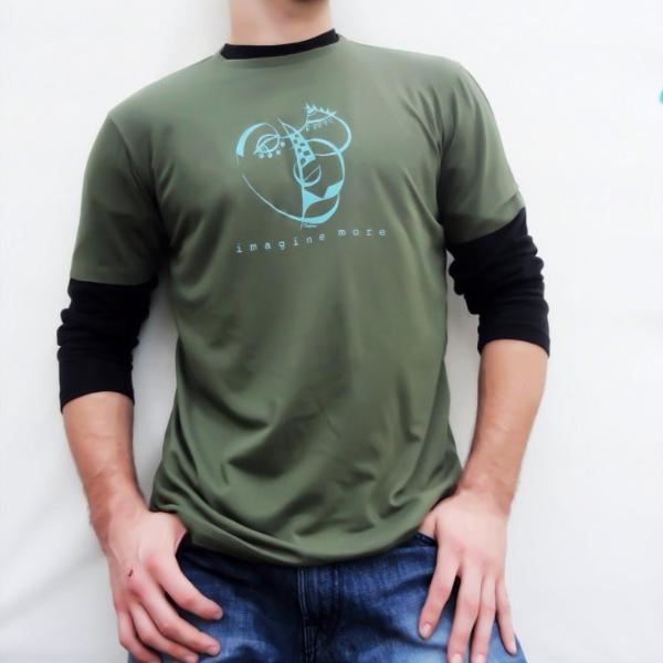 Olive green men's art t-shirt layered over black sleeves, featuring blue 'Imagine More' abstract print. Urban eco-style for creatives.