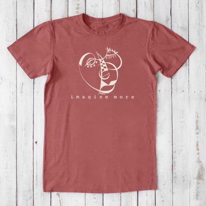 Rust red men's art t-shirt in bamboo and organic cotton with cream 'Imagine More' abstract print. Creative eco-friendly gift idea.