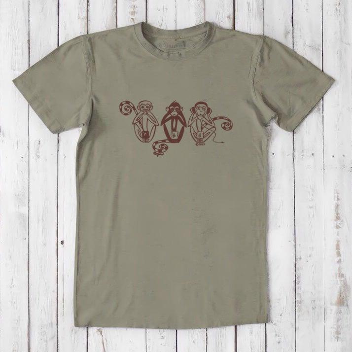 Olive green men's T-shirt with brown 'See No Evil Hear No Evil Speak No Evil' monkey print, eco-conscious and soft fabric blend.