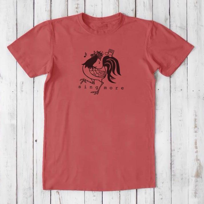 Red men's graphic tee with black rooster and 'Sing More' text, made from bamboo and organic cotton, perfect for morning people.