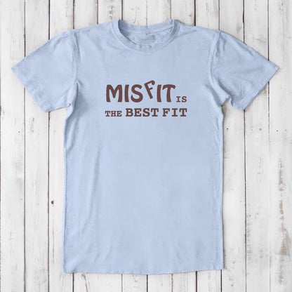 Light blue men's Misfit T-Shirt with brown text. Sustainable bamboo and organic cotton tee for self-expression and comfort.
