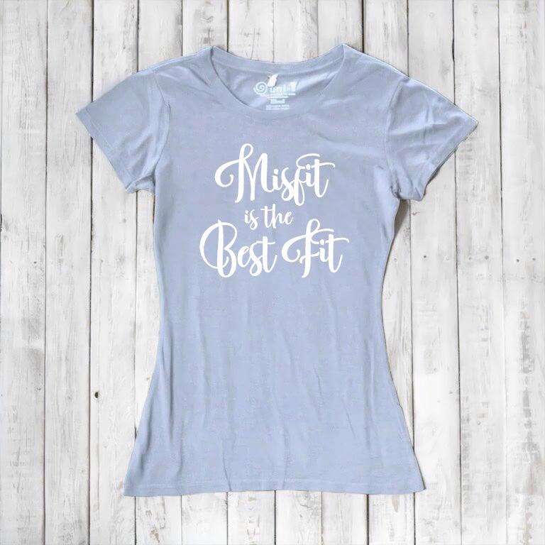 Light blue Women's Misfit T-Shirt in bamboo and organic cotton with white 'Misfit is the Best Fit' print. Sustainable and expressive fashion.