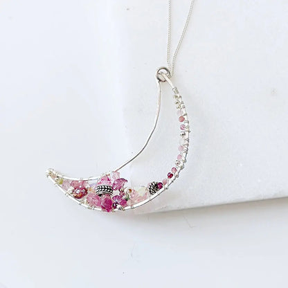 Moon Necklace Sterling Silver with pink crystals, pearls, and tourmaline on 18” chain, crescent shape design for elegant accessories.