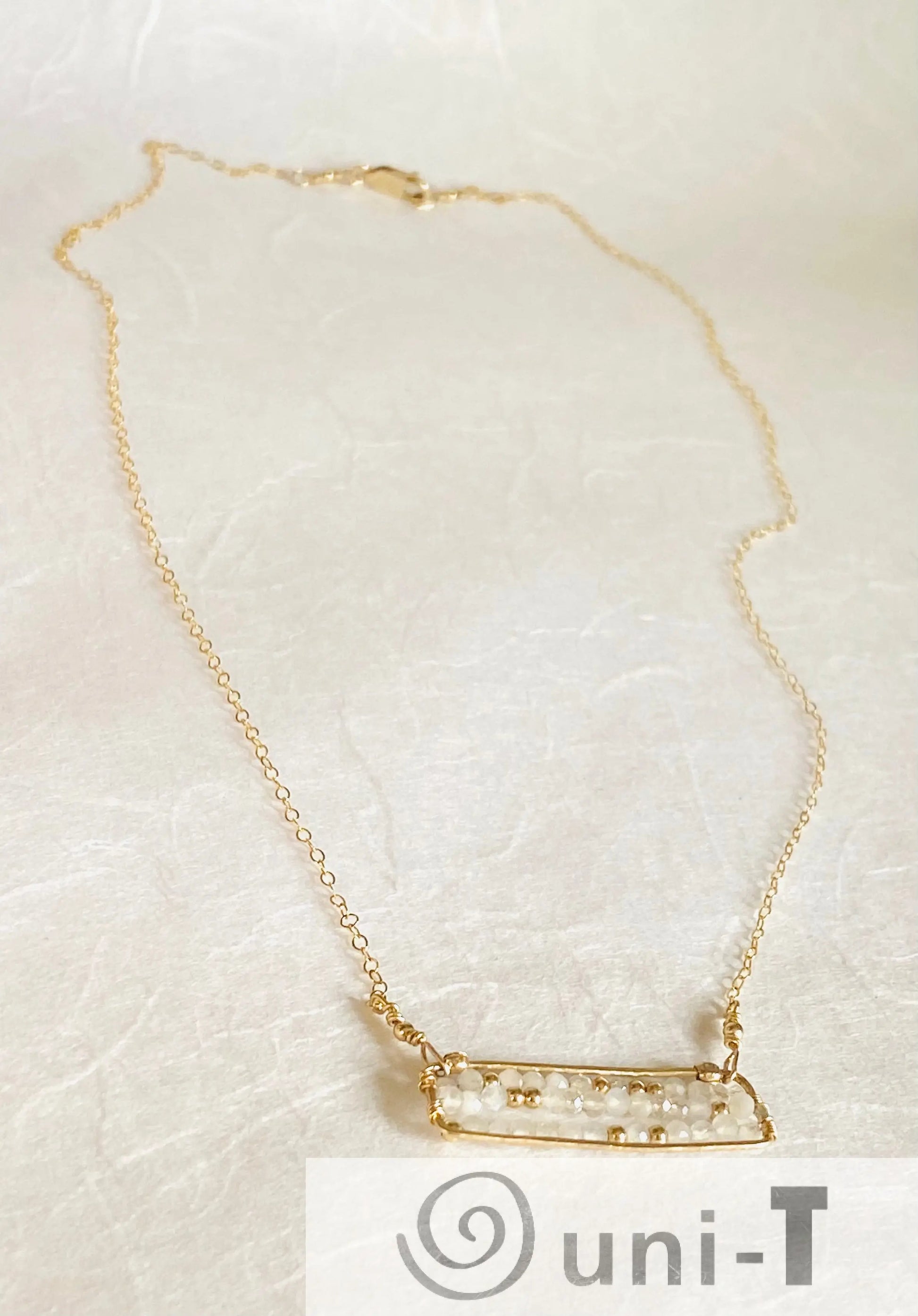 Full view of Moonstone Bar Necklace - Unique Gold-Filled Design with minimalist bar pendant and 18” chain. Elegant and modern jewelry piece.