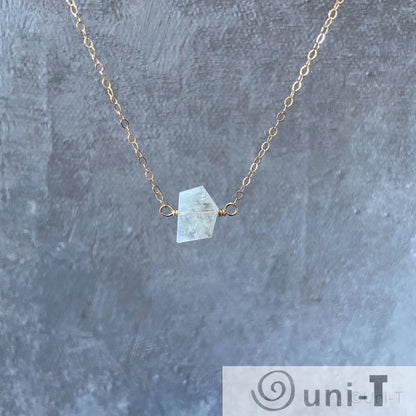 Moonstone gemstone necklace with hand-cut crystal pendant on 18-inch gold-filled chain, highlighting moonstone meaning and elegance.