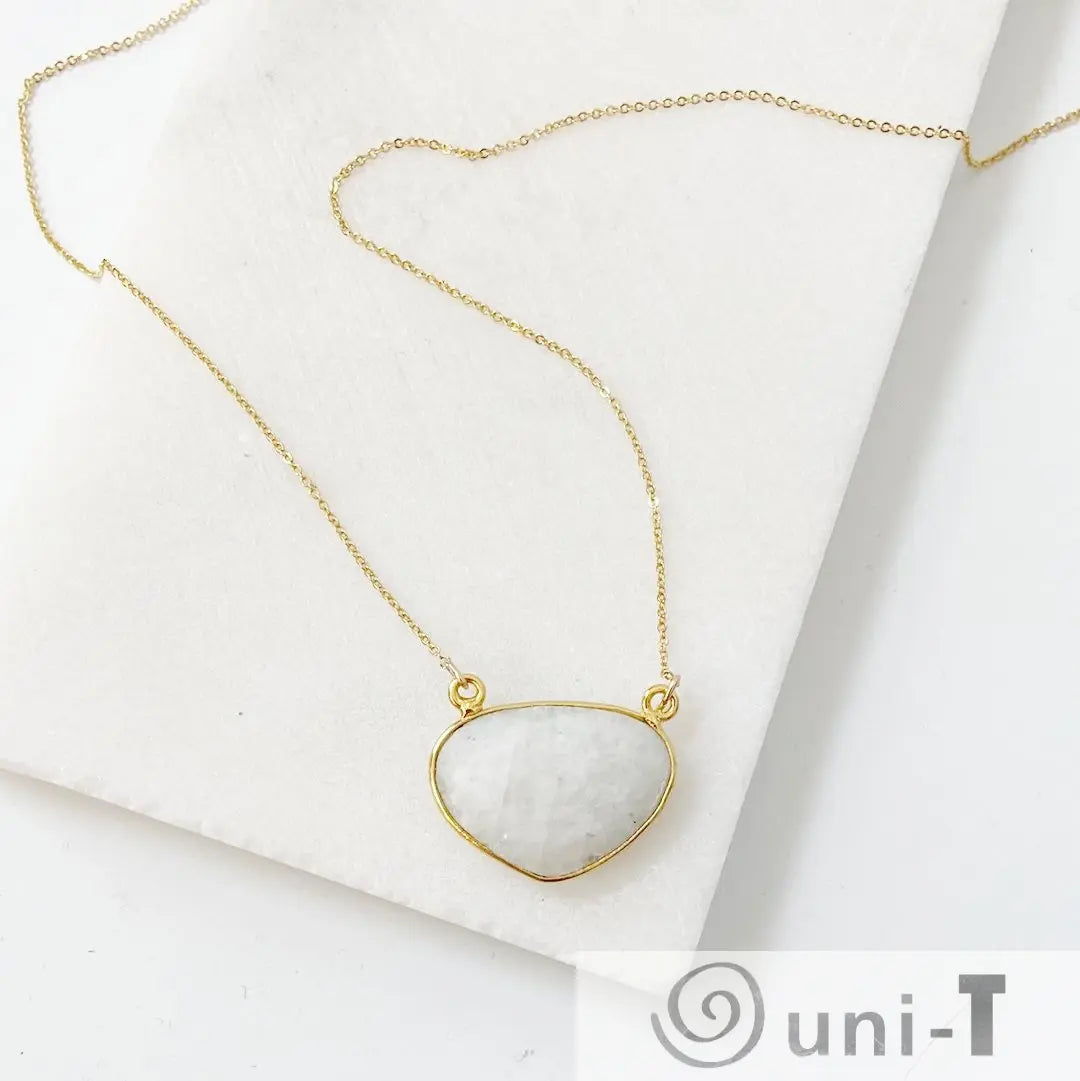 Moonstone necklace with gold filled chain and bezel-set gemstone pendant, adjustable to 18 inches. Elegant jewelry for everyday or special occasions.