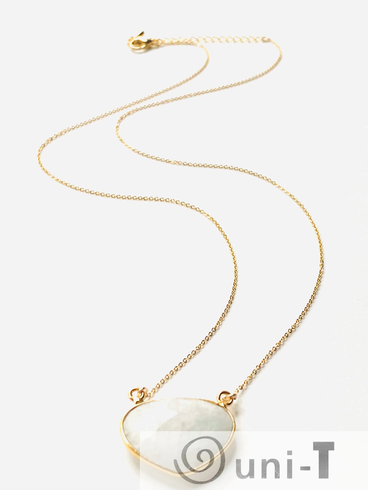 Full view of adjustable moonstone necklace with gold filled chain and lobster clasp. Ideal for gifting or personal wear.