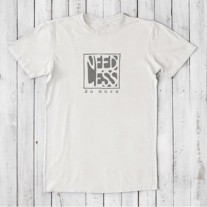 White men's motivational t-shirt in bamboo and organic cotton with 'Need Less Do More' quote. Ideal sustainable gift for productivity lovers.
