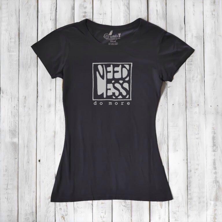 Black women's bamboo and organic cotton t-shirt with 'Need Less Do More' graphic. Sustainable inspirational gift for minimalist lifestyle.