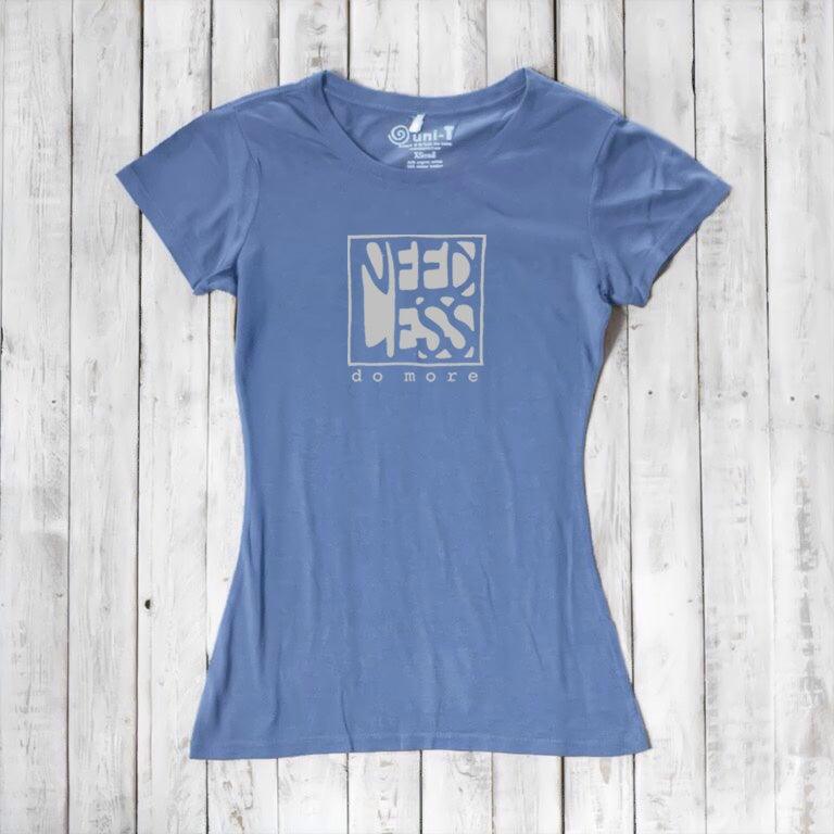 Dusty blue women's motivational t-shirt made from bamboo and organic cotton. Features 'Need Less Do More' quote for minimalist living.