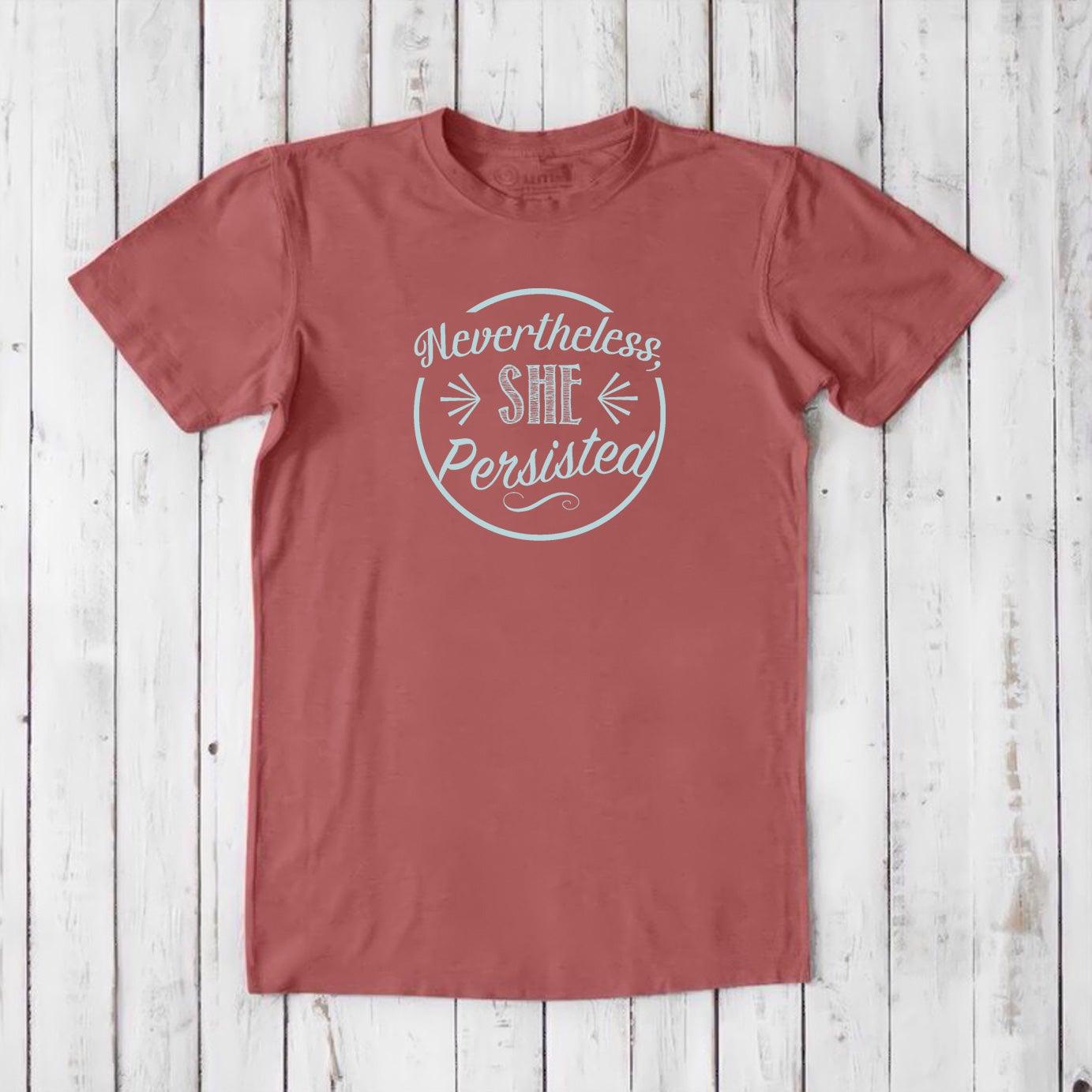 Men's 'She Persisted' T-Shirt in red bamboo cotton blend, empowering feminist message tee for eco-conscious men.