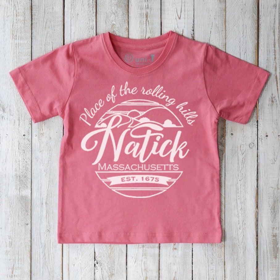 Pink Kids' Natick Organic Cotton T-Shirt featuring Massachusetts town pride design. Sustainable graphic tee gift for children by Uni-T.