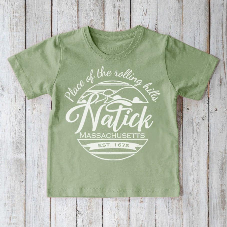 Green Kids' Natick Organic Cotton T-Shirt with local town pride print. Soft eco-conscious graphic tee for kids by Uni-T.