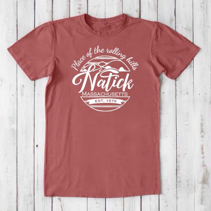 Rust red men's Natick T-Shirt in bamboo & organic cotton with white 'Natick, MA' graphic. Eco-conscious classic fit tee for hometown pride.