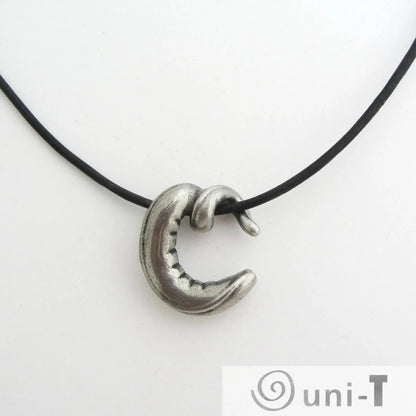 Nematode C elegans Necklace - Scientific Jewelry featuring a silver-tone pendant shaped like the C. elegans roundworm on a black cord. Ideal for science lovers.