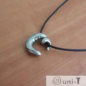 Close-up of Nematode C elegans Necklace - Scientific Jewelry with detailed worm-like pendant design, perfect for biology enthusiasts and unique accessory collectors.