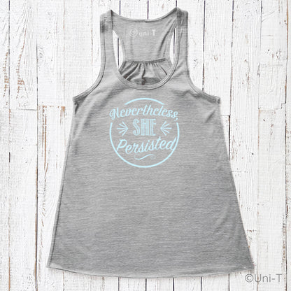 Gray racerback tank top with light blue 'Nevertheless She Persisted' print. Eco-friendly ink on strength apparel for women.