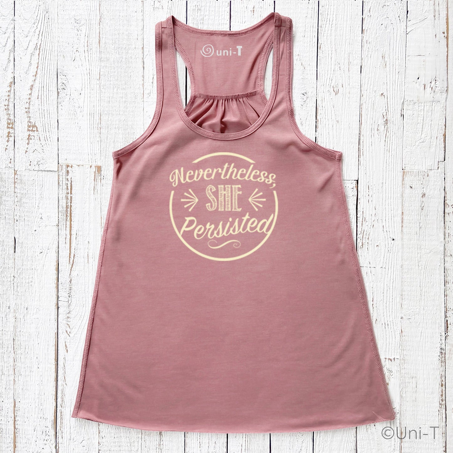 Mauve racerback tank top with cream 'Nevertheless She Persisted' design. Empowering women's tank top in soft, flattering fabric.