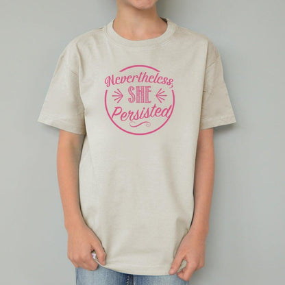 Child wearing cream Uni-T organic cotton T-shirt with pink 'Nevertheless, She Persisted' graphic. Empowering sustainable fashion for kids.