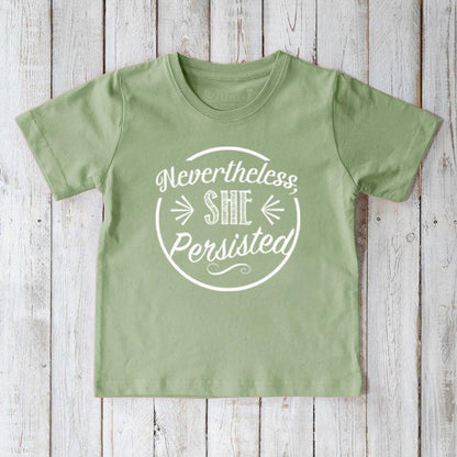 Light green organic cotton T-shirt for kids featuring white 'Nevertheless, She Persisted' graphic. Sustainable empowerment tee by Uni-T.