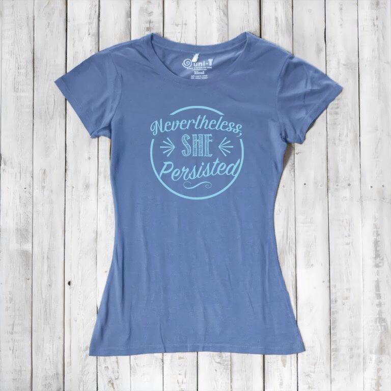 Periwinkle blue women's 'Nevertheless She Persisted' t-shirt with light blue text. Eco-conscious bamboo and organic cotton top by Uni-T.