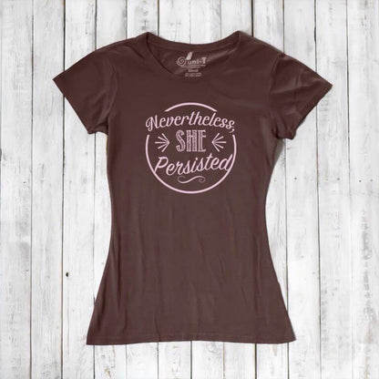 Chocolate brown 'Nevertheless She Persisted' women's t-shirt with pink text. Feminist empowerment top in sustainable bamboo and cotton blend.