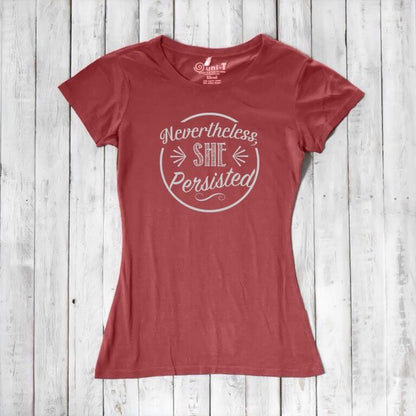 Coral red 'Nevertheless She Persisted' women's tee with white text. Eco-friendly bamboo and organic cotton feminist shirt by Uni-T.