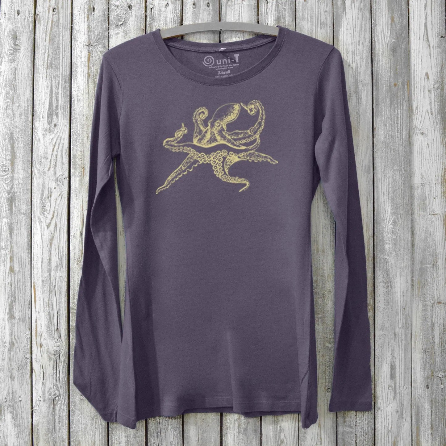 Dark purple Women's Octopus Long Sleeve T-Shirt crafted from bamboo and organic cotton, adorned with a golden marine octopus illustration.