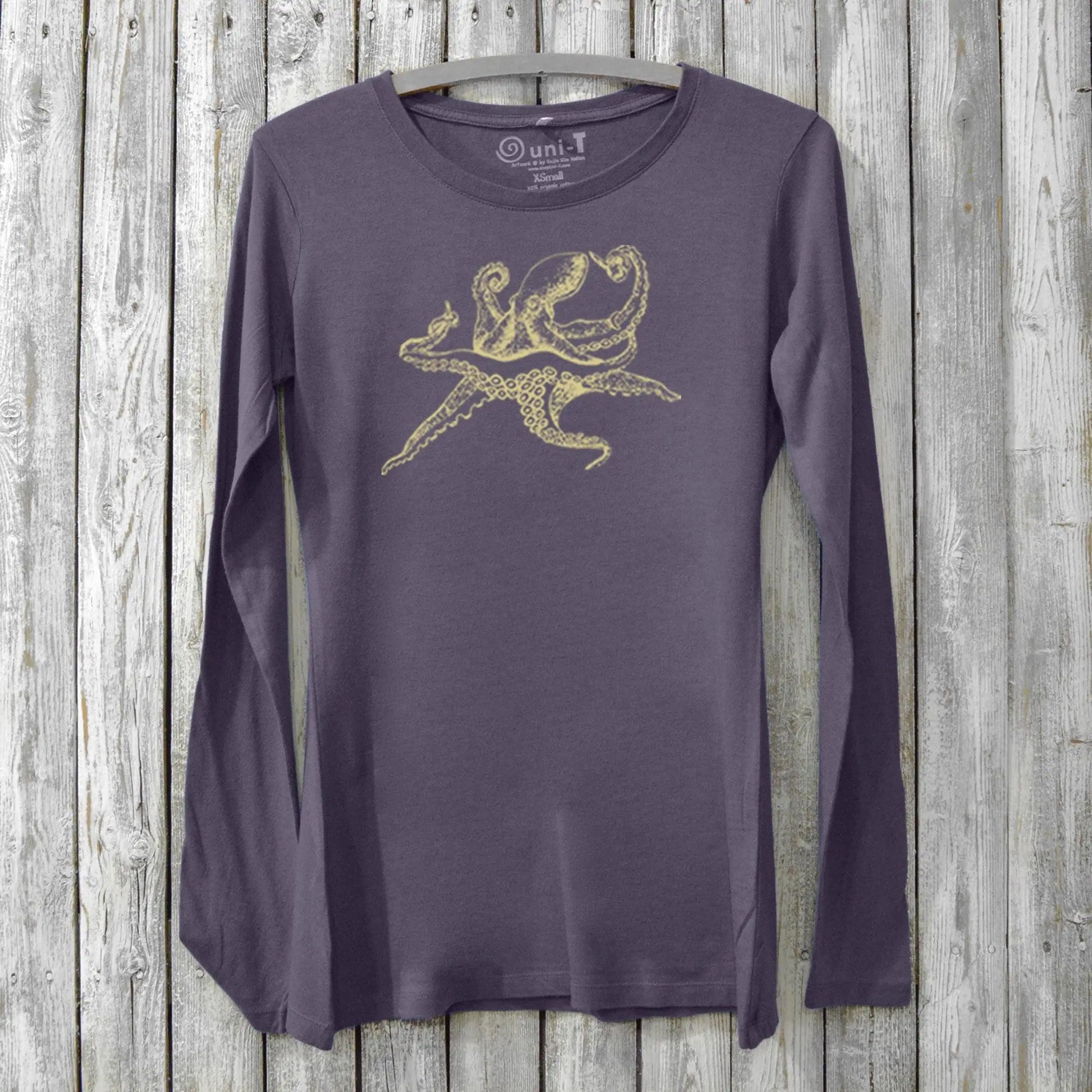 Dark purple Women's Octopus Long Sleeve T-Shirt crafted from bamboo and organic cotton, adorned with a golden marine octopus illustration.