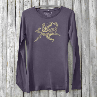 Dark purple Women's Octopus Long Sleeve T-Shirt crafted from bamboo and organic cotton, adorned with a golden marine octopus illustration.