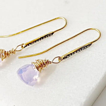 Close-up of Opalite Quartz Earrings with gold wire wrap and shimmering moonstone accents, showcasing fine craftsmanship and delicate design.