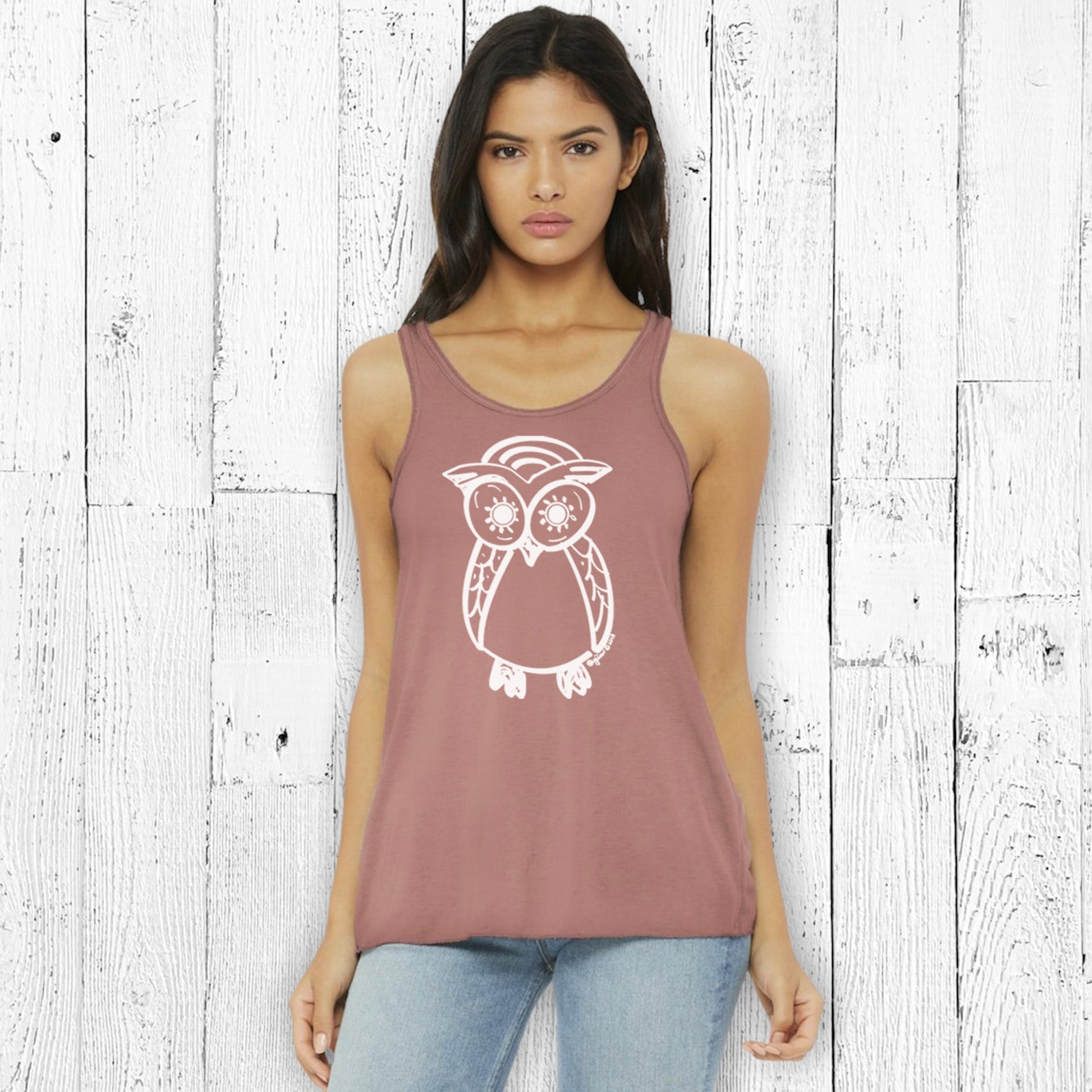 Model wearing Owl Flowy Tank Top for Women in mauve with white owl print. Soft blend fabric offers comfort and style for everyday outfits.