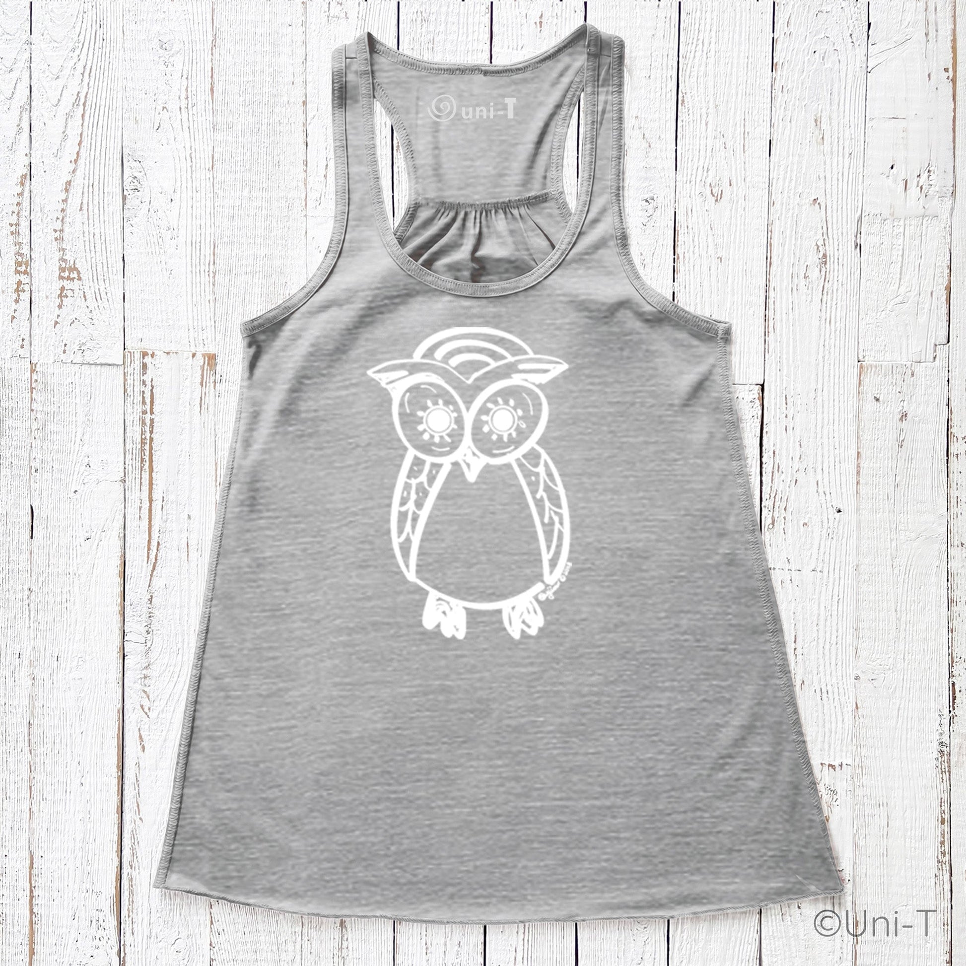 Heather gray Owl Flowy Tank Top for Women with white owl design. Relaxed fit and racerback cut made from soft poly-viscose blend.
