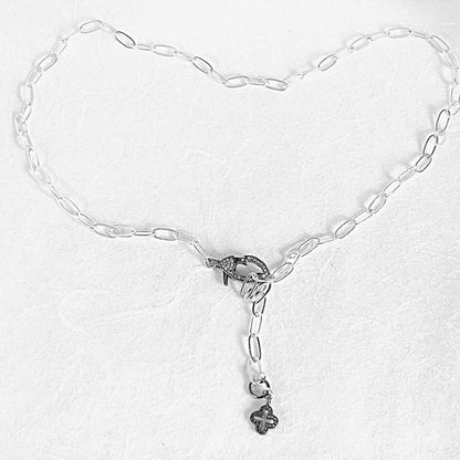 Full view of paperclip chain necklace with moonstone clasp and antiqued silver charm, adjustable up to 19 inches for custom styling.