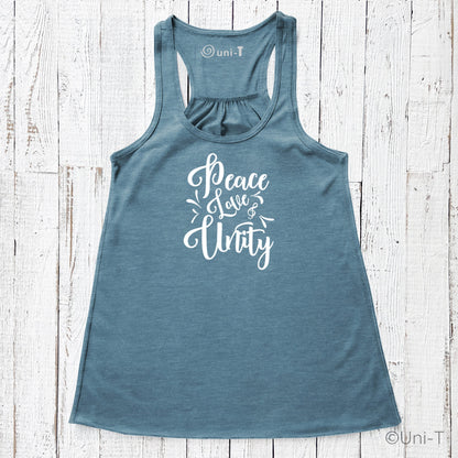 Blue "Peace Love Unity" Tank Top - Embrace Harmony featuring white lettering, displayed flat on a white wood background.